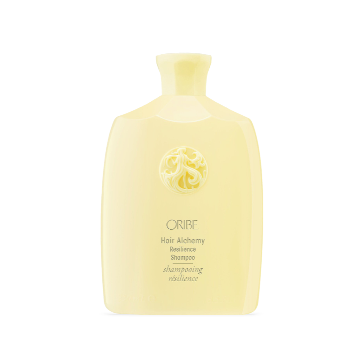 Oribe Hair Alchemy Resilience Shampoo bottle, a luxurious yellow-toned haircare product with the distinctive Oribe logo, designed to strengthen and hydrate weak hair.