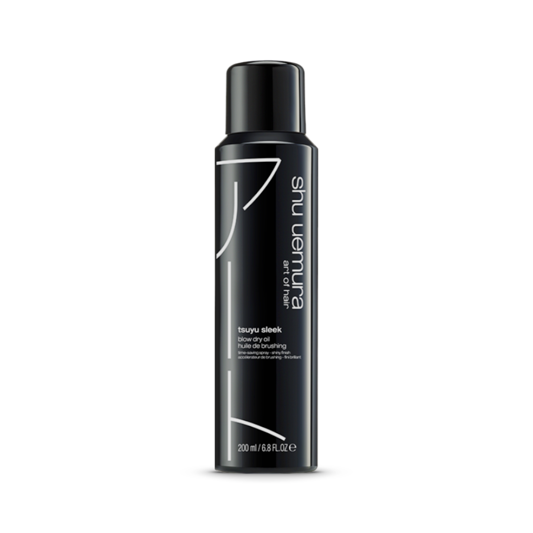 Elegant black aerosol can of Shu Uemura Tsuyu Sleek Blow-Dry Oil, 200ml/6.8fl.oz, designed to reduce blow-dry time and tame frizz, leaving hair sleek, shiny, and ready to style.