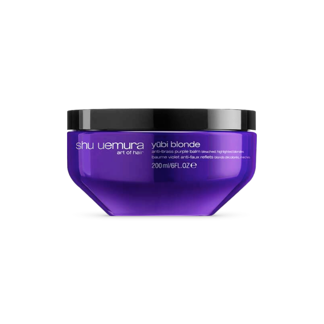 A sleek, deep purple tub of Shu Uemura Yūbi Blonde Anti-Brass Purple Hair Mask, containing 200ml/6fl.oz of product. Designed specifically to care for bleached and highlighted hair, its luxurious formula helps neutralize brassiness and promote hair health.
