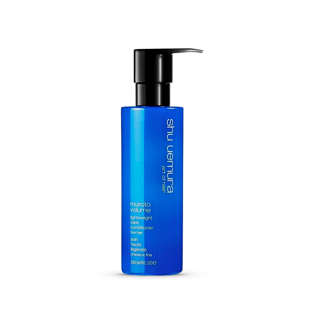 Shu Uemura Muroto Volume Lightweight Care Conditioner bottle with pump, 250ml/8 fl.oz, on a white background. The bottle is a vibrant blue with black pump top and white text detailing the product&#39;s purpose for fine hair.